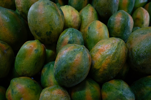 papayas on a market