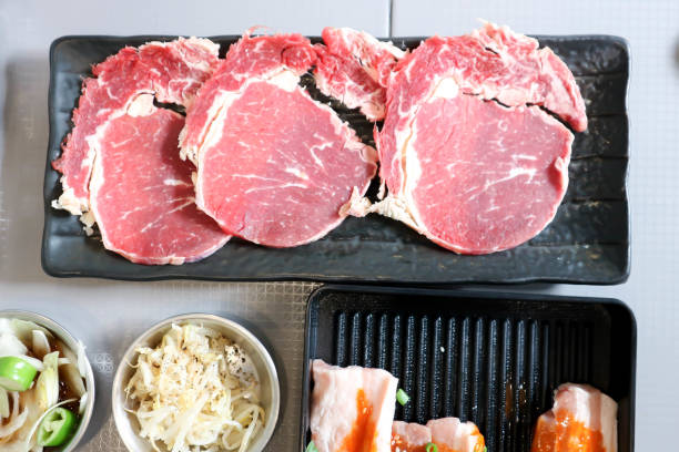istock raw beef , sliced beef or beef for cook and Korean salad 1807904079