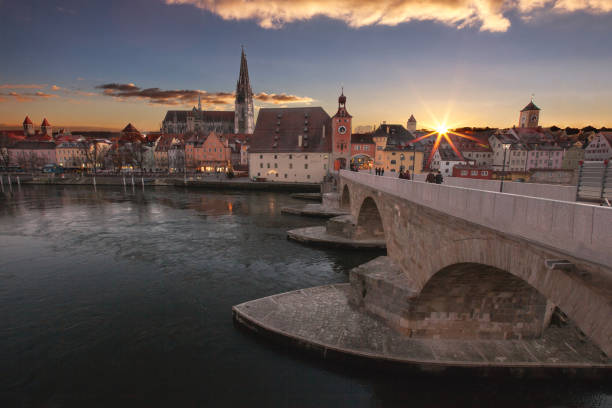 istock Sunset in Regensburg on the Danube over the stone bridge 1807913563