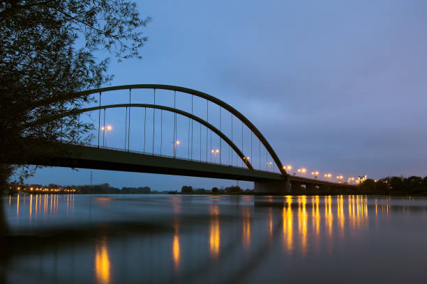 istock Schwabelweis Danube Bridge in Regensburg with reflection in the Danube 1807921407
