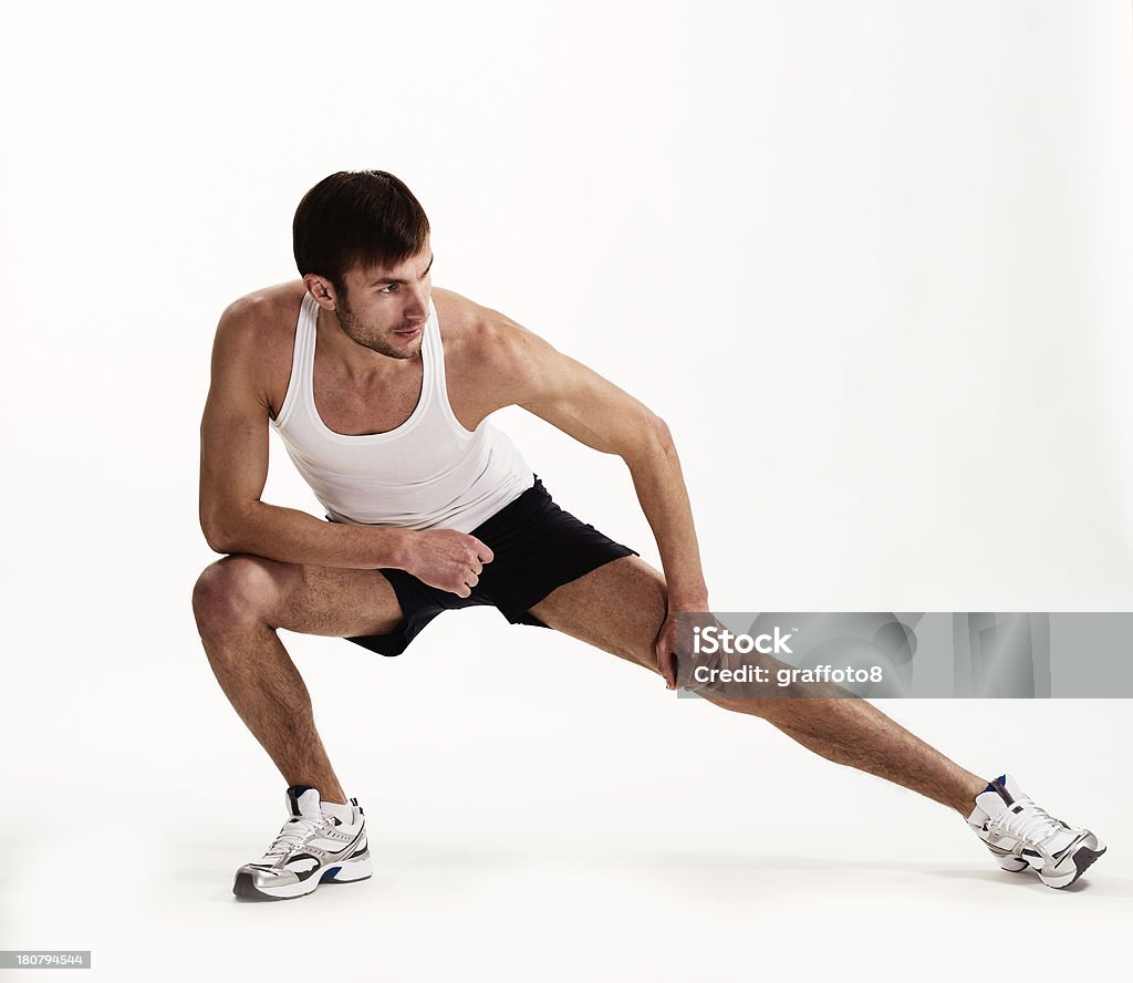 Uomo atleta - Foto stock royalty-free di Abbigliamento