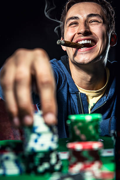 Cheerful poker player Cheerful poker player dibs stock pictures, royalty-free photos & images