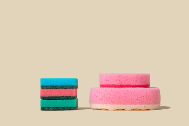 istock Colorful sponges on beige background 1807968703