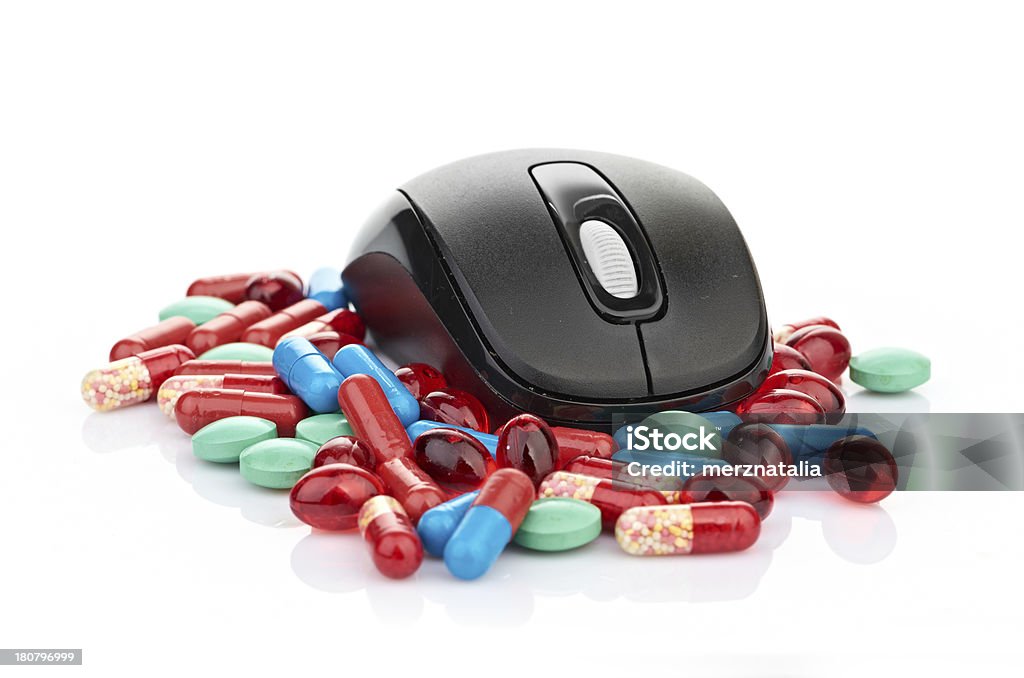 mouse and pills Addiction Stock Photo