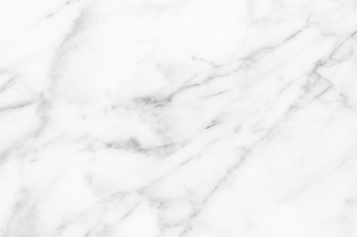 White Carrara Marble texture, background or pattern for bathroom or kitchen white countertop. High resolution photograph.