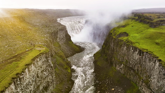 Aerial view of Famous Waterfall Dettifoss The largest waterfall in Iceland. Water falling from Dettifoss waterfall in slow motion.