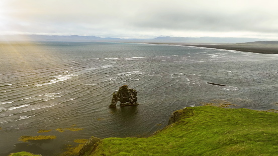 Aerial View of Hvtserkur Rock and Birds Flying Above, Landmark of Iceland