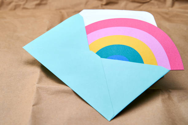 istock Rainbow coming out of a card. 1808010233