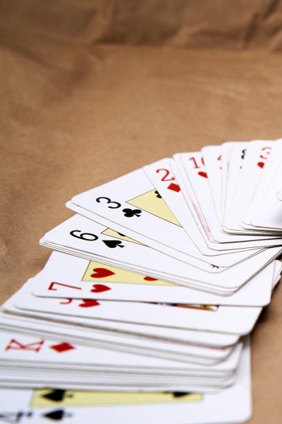 istock A deck of poker cards spread out on a table. 1808018350