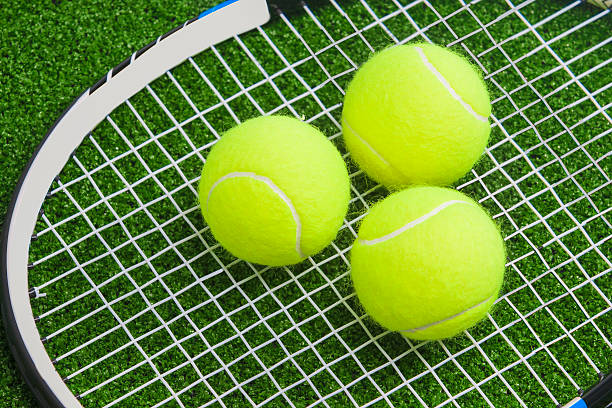 istock Concept of three Balls on a Tennis Racket Strings 180802070