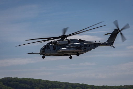 Westfield, United States – May 20, 2023: United States Marine MH-63 helicopter performing an aerial demonstration at an airshow in western Massachusetts
