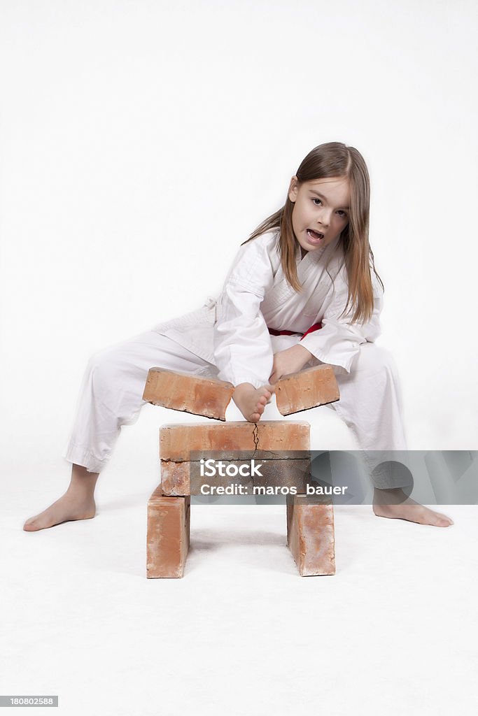 Karate garota intervalos de bloco 2 - Foto de stock de Caratê royalty-free