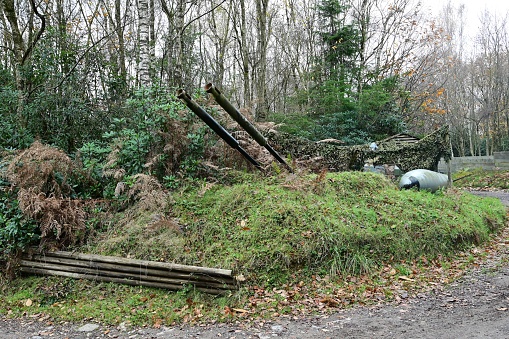 Camouflaged defensive gun emplacement in the UK.