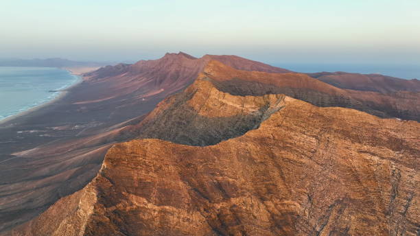 istock Volcanic hills and Atlantic Ocean. Cofete beach, Parque Natural 1808041088