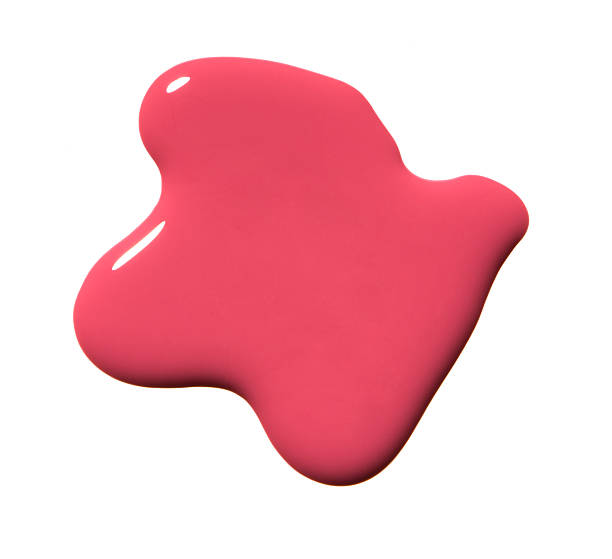 Fuchsia pink nail polish splatter on a white background