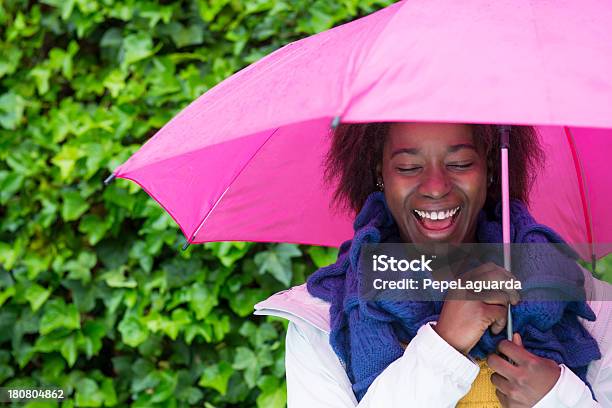 Happy woman under the rain