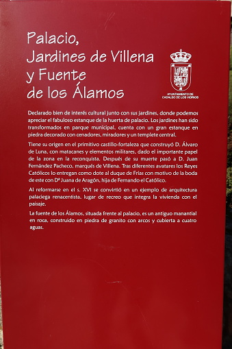 Cadalso de los Vidrios, Madrid, Spain, November 18, 2023: Information sign next to the Villena Palace of Cadalso de los Vidrios, Madrid, Spain