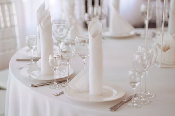 istock White served table at a restaurant on a wedding celebration. 1808052818