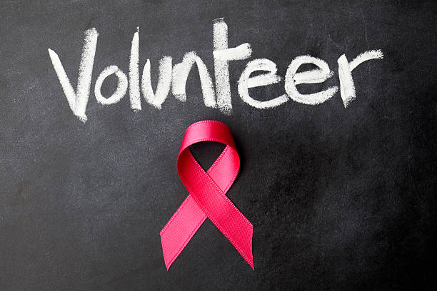 istock Volunteer - Pink awareness ribbon 180805282