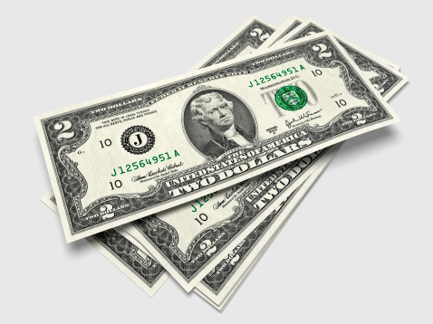 3D render of  bills of two dollars all in sharp focus.