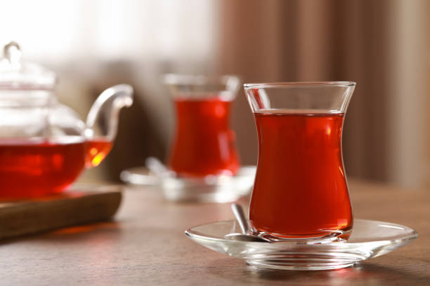istock Glasses with traditional Turkish tea on wooden table, space for text 1808054902