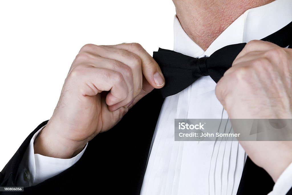Человек нас с галстуком-бабочкой - Стоковые фото Белый фон роялти-фри