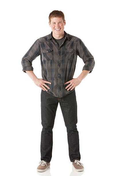 istock Happy man standing with hand on hip 180806189