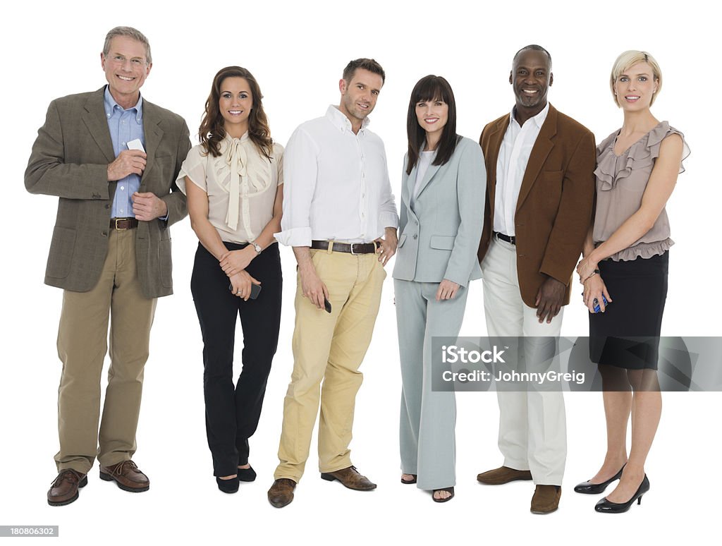 Business People Standing Together Full length group portrait of confident multi-ethnic business people standing together over white background. 20-29 Years Stock Photo