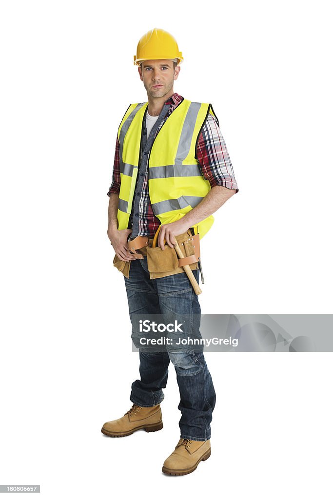 Male Construction Worker Wearing Protective Clothing Full length portrait of confident male construction worker wearing protective clothing standing against white background. Construction Worker Stock Photo