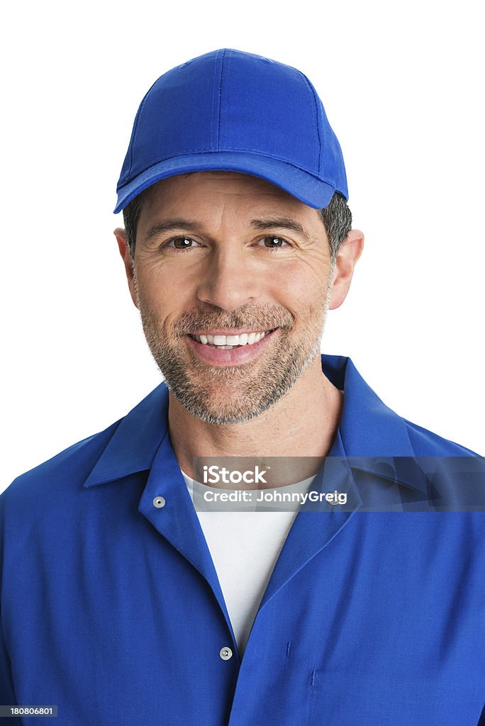 Bonito sorridente em uniforme azul Empreiteiro de Reparações - Royalty-free Boné de Basebol Foto de stock