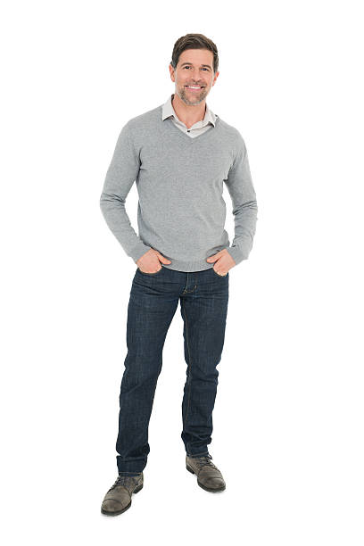 istock Mature Man Standing With Hands In Pockets 180807008