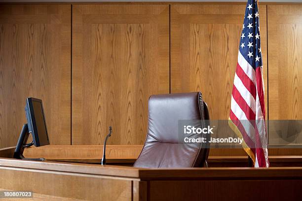 An Empty Courtroom Bench With U S Flag Stock Photo - Download Image Now - Courtroom, Testimony, American Flag