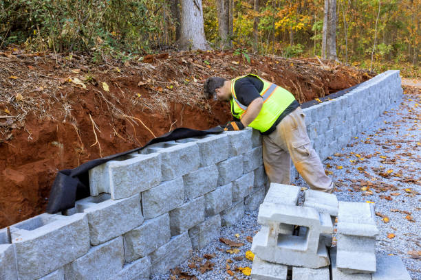 istock Contractors were installing new wall on construction site a large block retaining wall during process of installation 1808073306