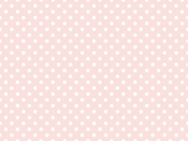 istock texturised white color polka dots over misty rose off white back 1808073829