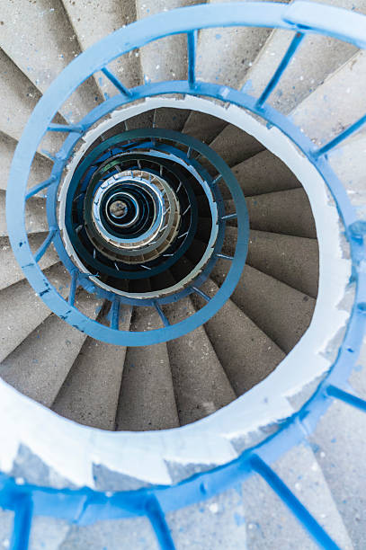 istock Spiral staircase, tower interior, blue railing, directly above 180808801