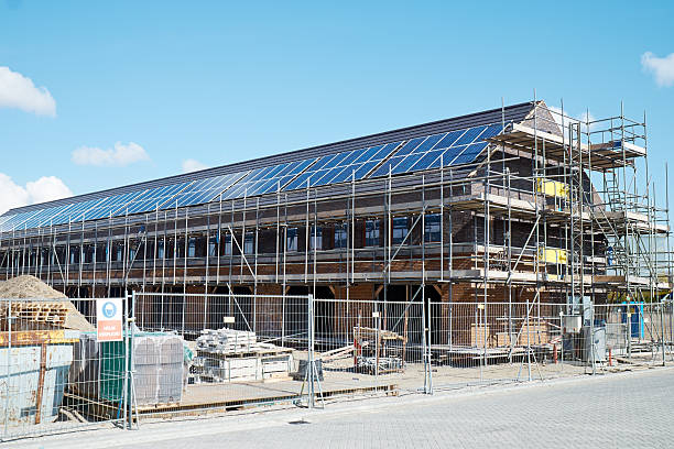 istock House construction site of houses with solar panels 180809048