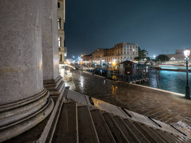 Fondamenta del Monastero street on a rainy night, Venice, Italy stock photo