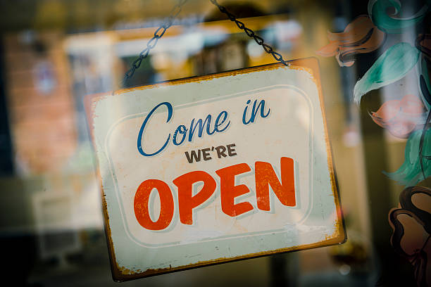 istock Business Opening with Open Sign 180809546