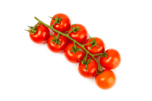 istock Sprig of cherry tomatoes isolated on white background. Red fresh tomatoes. Fresh vegetables. Vegan. Close-up. Healthy food. Salad Ingredients. 1808097918