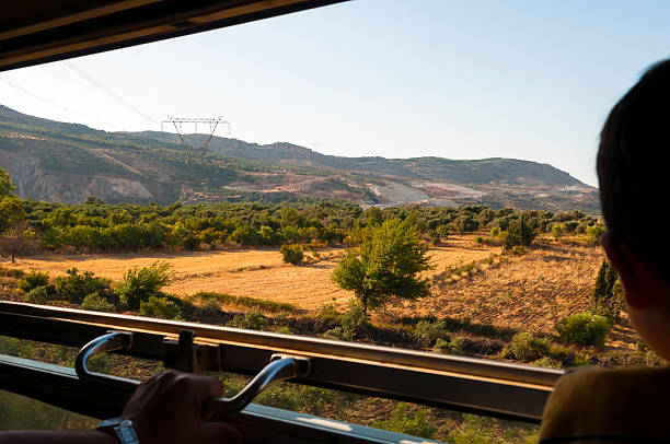 istock Syrians looking out train window traveling from Aleppo to Latakia 180810240