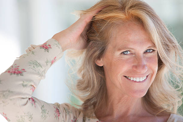 istock Beautiful Mature Woman Smiling 180810442