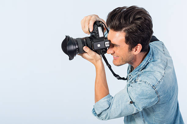 istock Photographer Taking a Photo 180810593