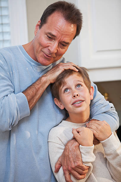istock Father and preteen son 180810625