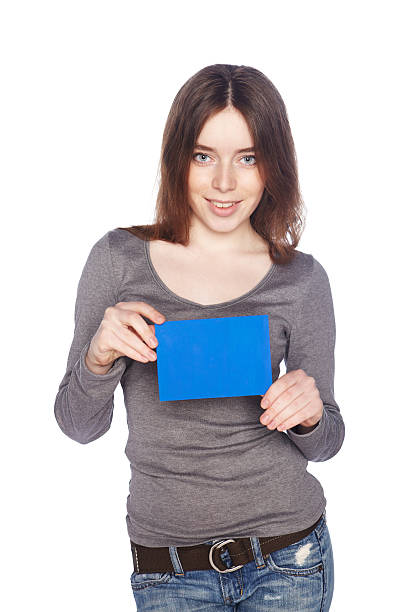 istock Beautiful girl with blank blue banner. 180810737