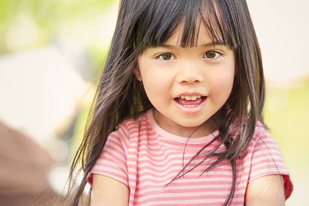 istock happy children are playing in the park 180810987