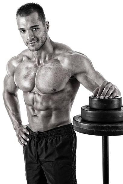 若い bodybuilder - chest sweat male pectoral muscle ストックフォトと画像