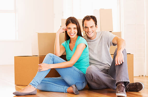 istock Happy Couple Moving Into New House 180811222