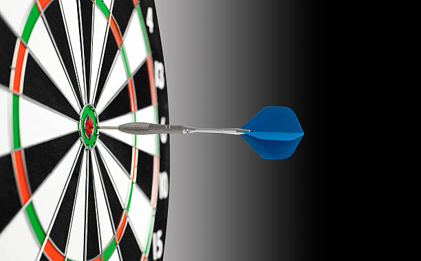 istock Dart and Dartboard with graduating Background 180811309