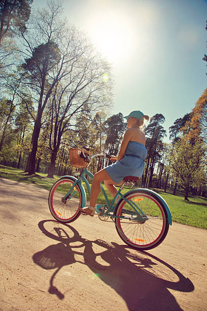 istock Woman riding bicycle 180811474