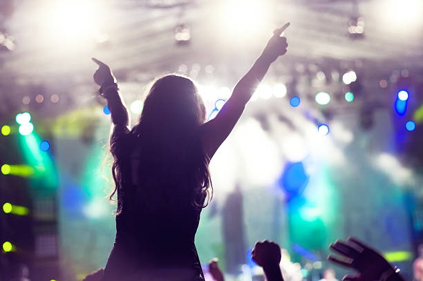 istock Girl at a concert 180812022